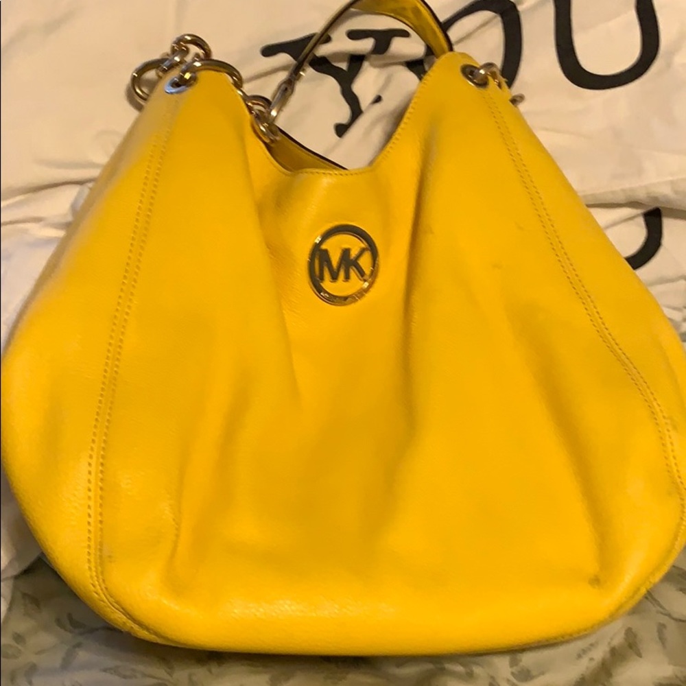 MK yellow purse